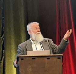 Charles accepting award